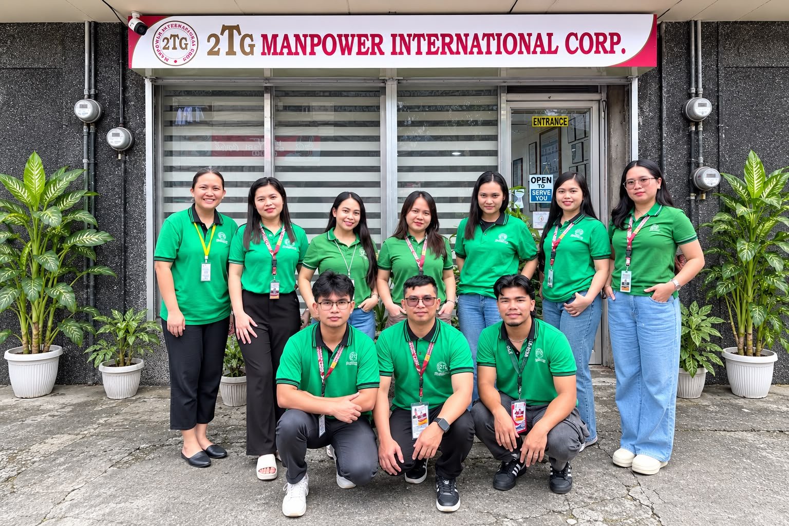 2TG Manpower International Corp Manila team in front of the office